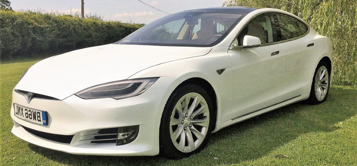 Tesla Model S on grass for display