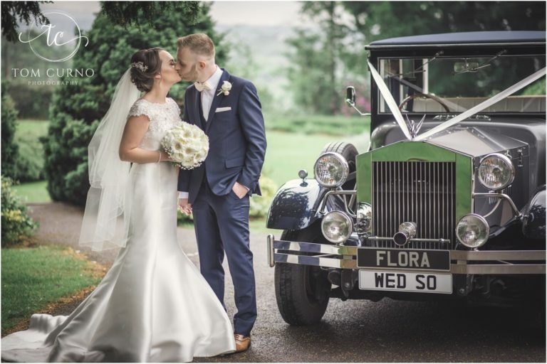 husband and bride professional photograph with car