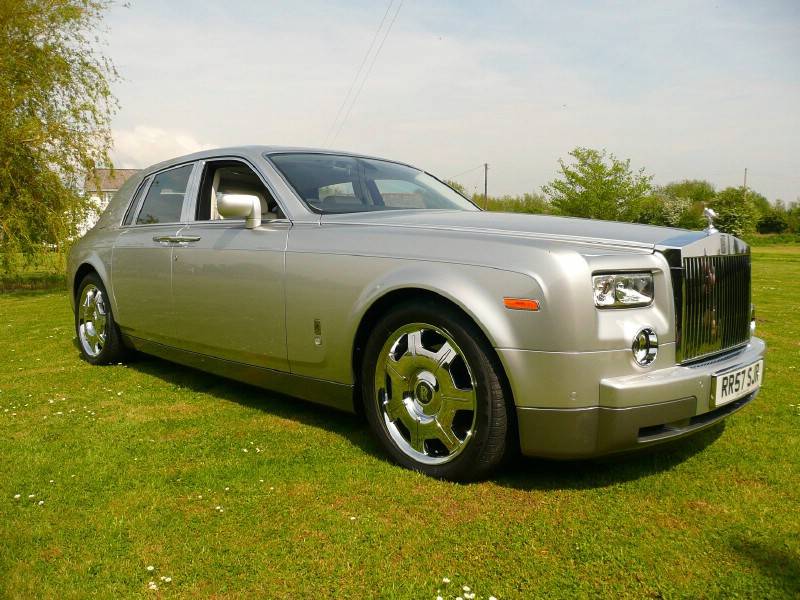 rolls royce phantom on grass field