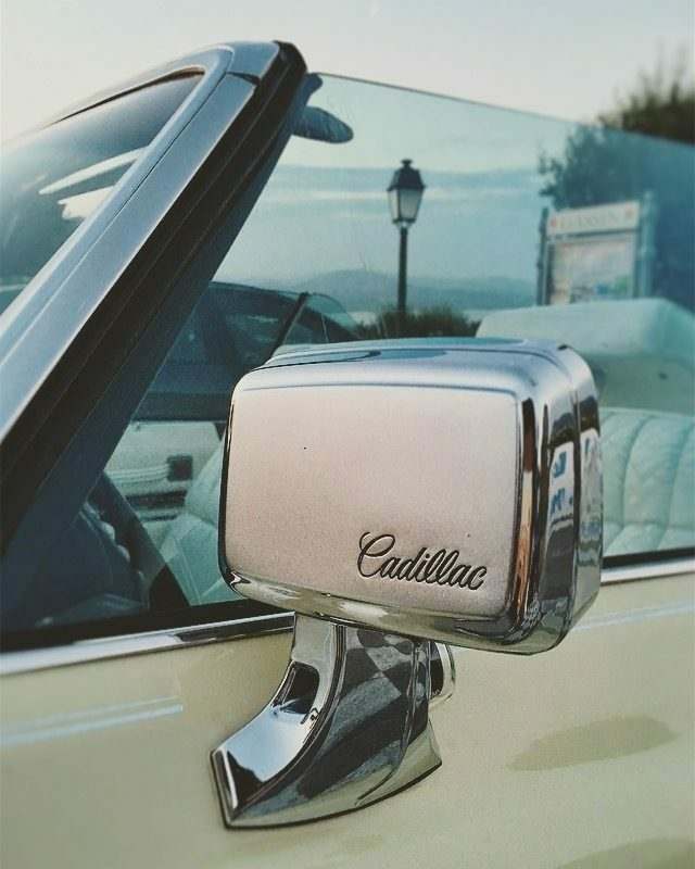 cadillac wingmirror with drop down sun roof