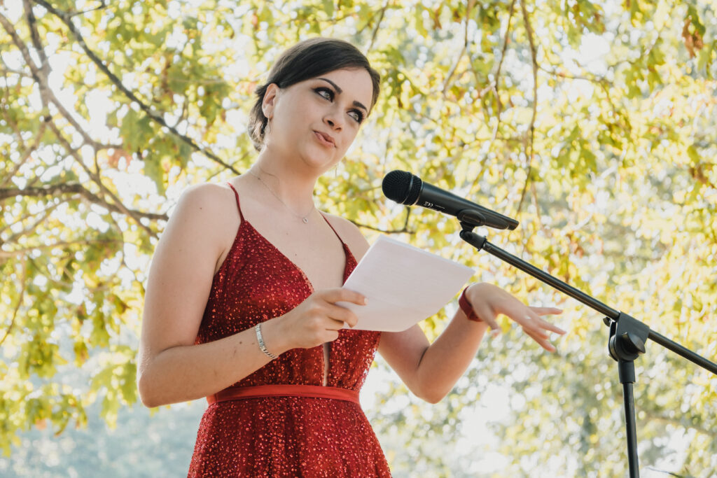 girl reading wedding speech 